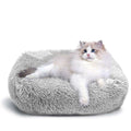 Light gray plush cat bed for indoor cats and small dogs up to 25 lbs with non-slip waterproof bottom