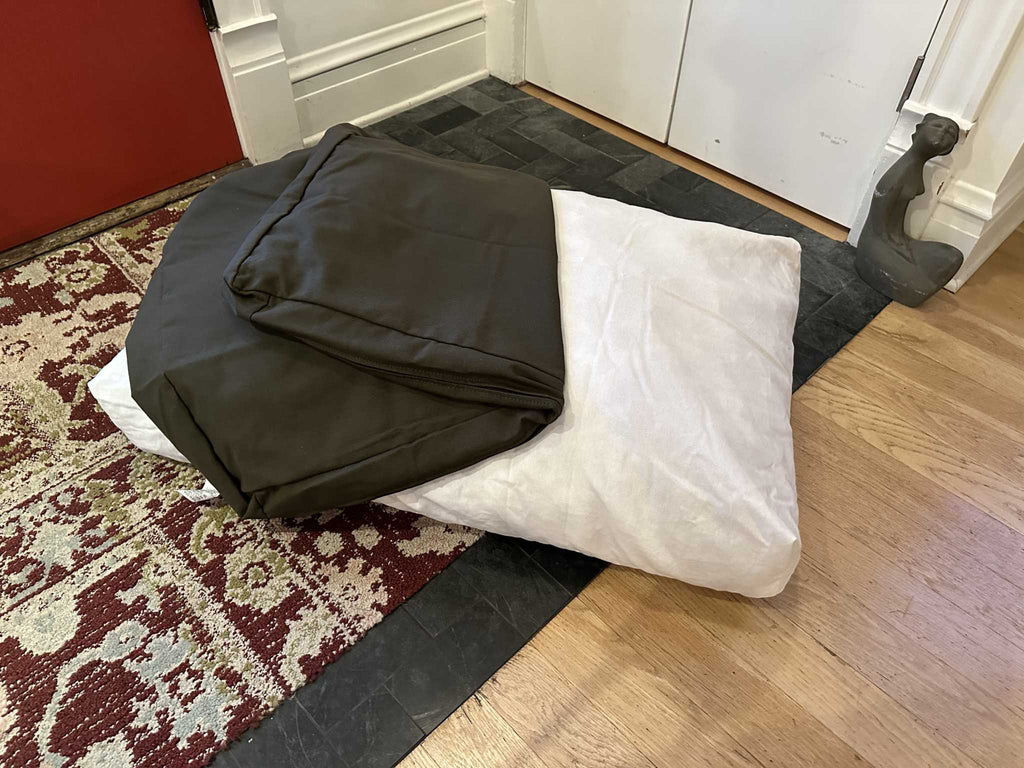 Heavy-duty cotton duck dog bed with CertiPUR foam fill and washable zippered cover