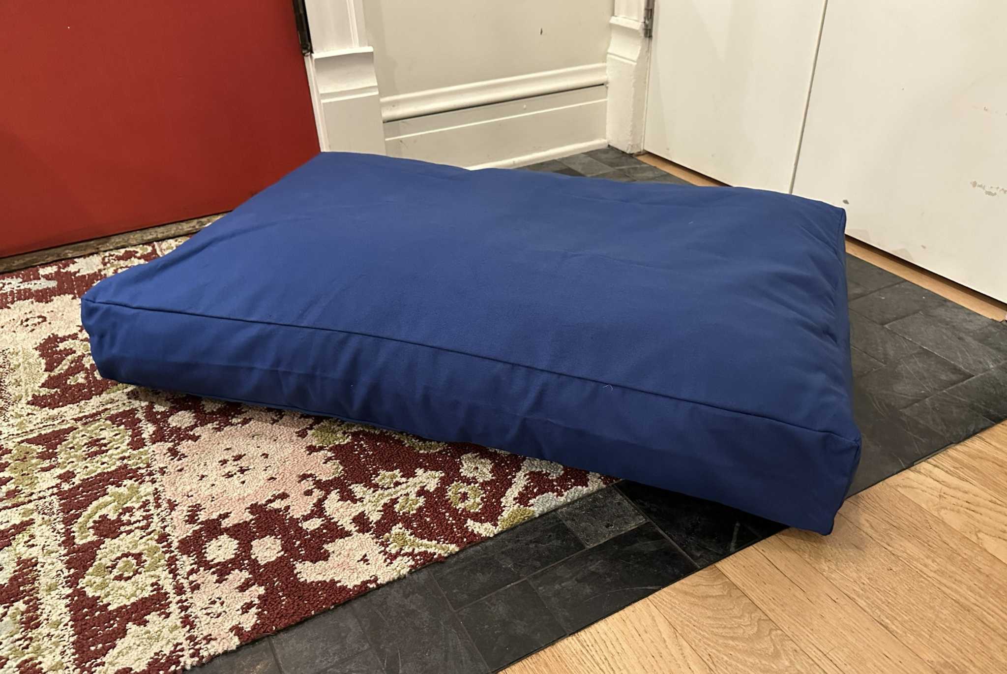 Heavy-duty Cotton Duck Dog Bed with CertiPUR foam fill, breathable and washable cover.