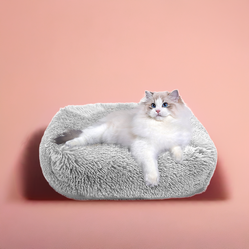 Light gray plush cat bed for indoor cats and small dogs up to 25 lbs with non-slip waterproof bottom